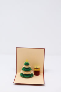 Christmas tree with a cylindrical gift