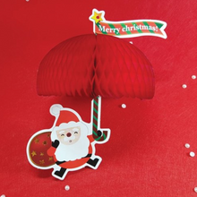 Load image into Gallery viewer, Honeycomb Ornament Card - Santa Umbrella
